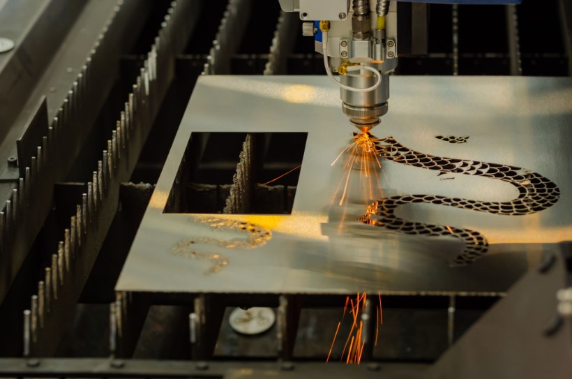 J.K. Fabricaters workshop &mdash; CNC laser cutting and fabrication in progress